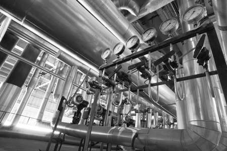 Equipment, cables and piping as found inside of a modern industrial power plantの写真素材