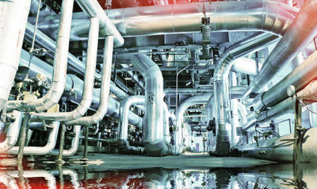 Equipment, cables and piping as found inside of a modern industrial power plant