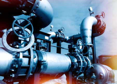 Industrial zone, Steel pipelines and cables in blue tonesの写真素材