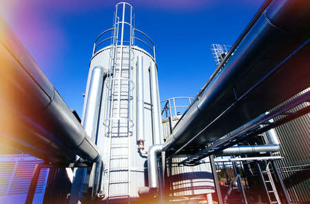 Industrial zone, Steel pipelines and equipment in blue tones