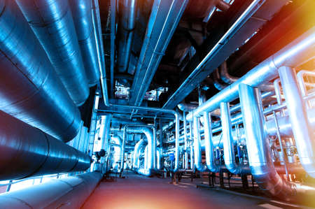 Industrial zone, Steel pipelines and cables in blue tonesの写真素材