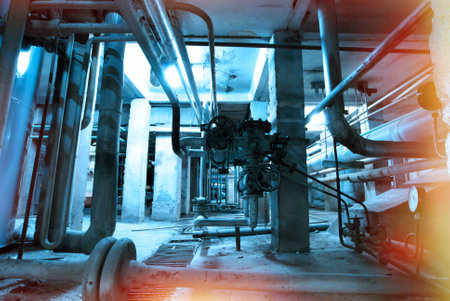 Industrial zone, Steel pipelines and cables in blue tonesの写真素材