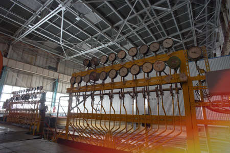 Equipment, cables and piping as found inside of a modern industrial power plant
