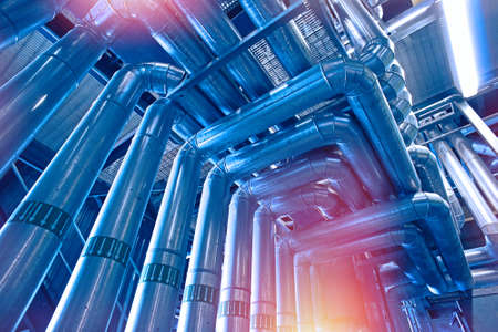 Equipment, cables and piping as found inside of a industrial power plant
