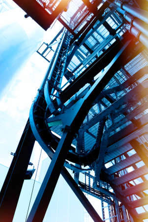 Industrial zone, Steel pipelines and cables in blue tonesの写真素材