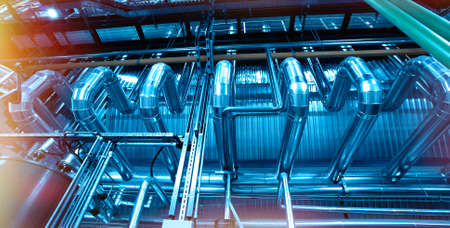 Industrial zone, Steel pipelines and cables in blue tonesの写真素材