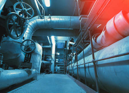 Industrial zone, Steel pipelines and cables in blue tonesの写真素材