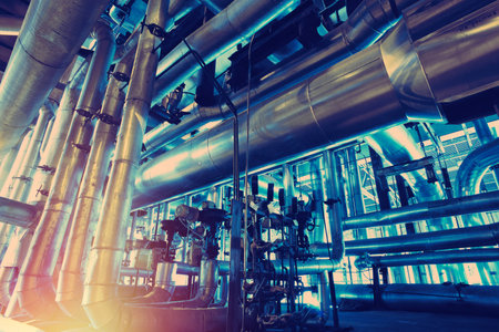 Equipment, cables and piping as found inside of a modern industrial power plantの写真素材