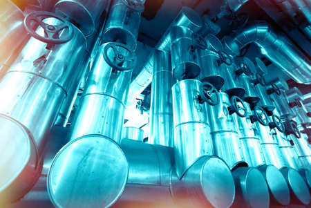 Industrial zone, Steel pipelines and cables in blue tonesの写真素材