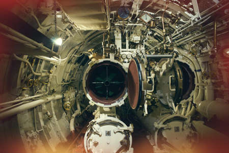Detailed view of valves and pipes in old submarineの写真素材