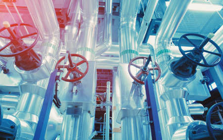 Equipment, cables and piping as found inside of a modern industrial power plantの写真素材