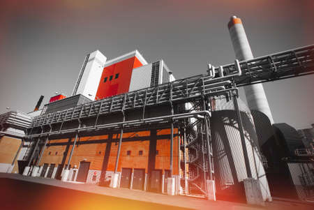 Modern industrial factory against blue skyの写真素材