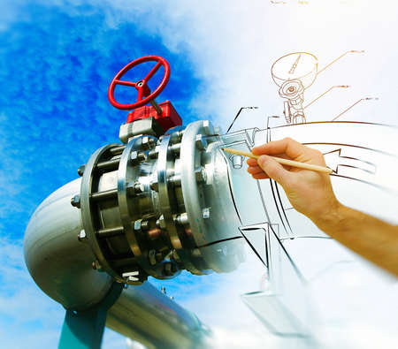 man's hand draws a design of factory combined with photo of modern industrial power plantの写真素材