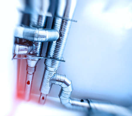 Ventilation pipes of an air condition. Toned image. Motion blur effect.の写真素材