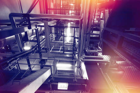 Industrial zone, Steel pipelines and cables in blue tonesの写真素材