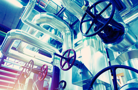 Equipment, cables and piping as found inside of a modern industrial power plantの写真素材