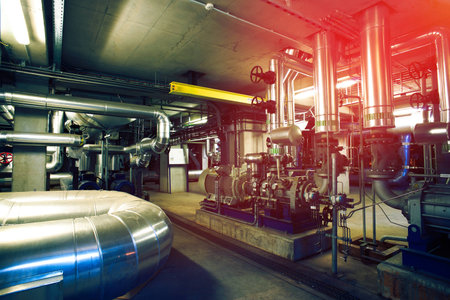 Equipment, cables and piping as found inside of a modern industrial power plantの写真素材