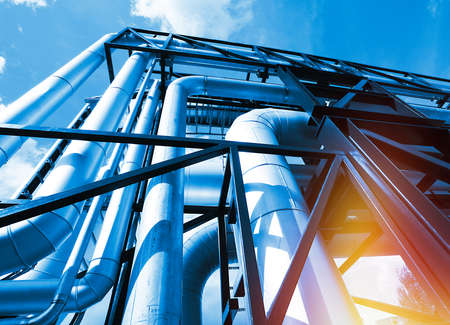 Equipment, cables and piping as found inside of a modern industrial power plantの写真素材