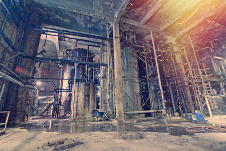Old creepy, dark, decaying, destructive, dirty factoryの写真素材