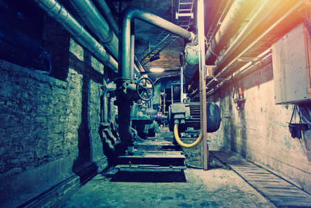 Old creepy, dark, decaying, destructive, dirty factoryの写真素材