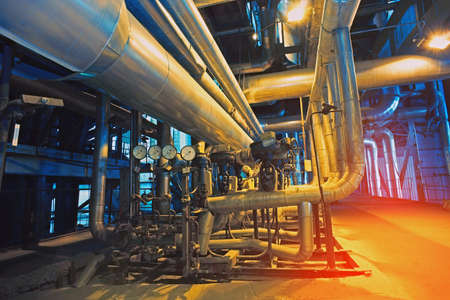 Equipment, cables and piping as found inside of a modern industrial power plantの写真素材