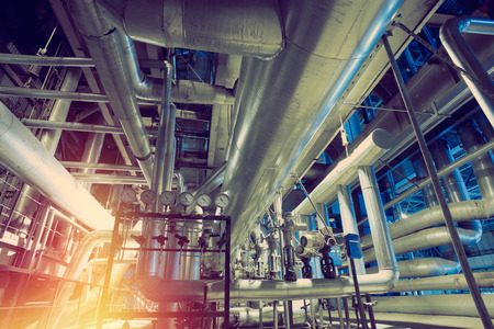 Equipment, cables and piping as found inside of a modern industrial power plantのeditorial素材