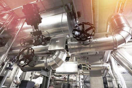 Equipment, cables and piping as found inside of a modern industrial power plantのeditorial素材