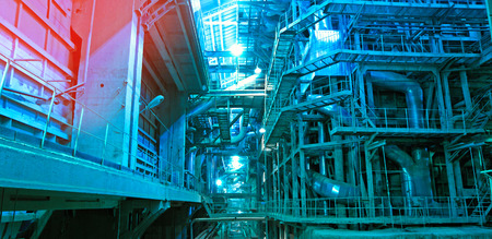 Industrial zone, Steel pipelines and cables in blue tonesのeditorial素材