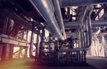 Industrial Steel pipelines, valves, cables and walkways             の写真素材