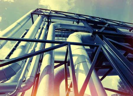Equipment, cables and piping as found inside of a modern industrial power plant       の写真素材