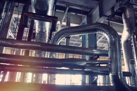 Industrial Steel pipelines, valves, cables and walkwaysの写真素材
