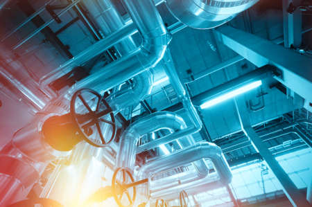 Equipment, cables and piping as found inside of a industrial power plantの写真素材