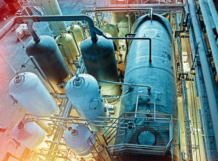 Equipment, cables and piping as found inside of a modern industrial power plant              