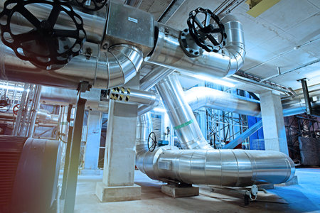 Equipment, cables and piping as found inside of a modern industrial power plantの写真素材