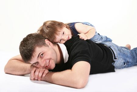 happy kid playing with a joyful fatherの写真素材