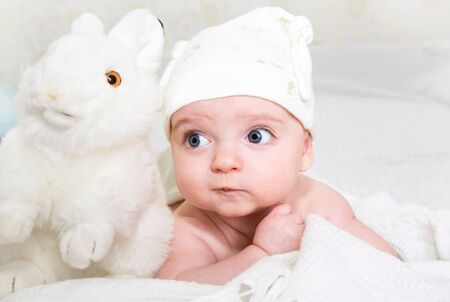 cute little baby with a toyの写真素材