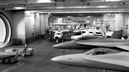 fighter aircraft on the inner deck of an aircraft carrier 3d render