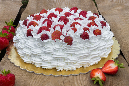 Light, delicate and tasty cream cake with fresh strawberriesの写真素材