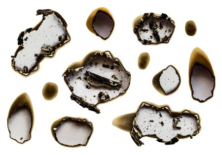 set of scorched holes white paper, isolated on white backgroundの写真素材