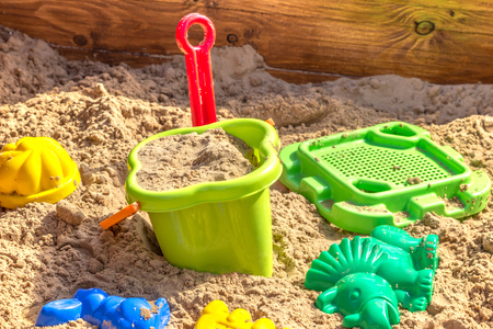 sandbox with toys on children playgroundの写真素材