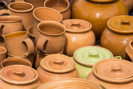 Clay mugs and pots, handmade, photo closeupの写真素材