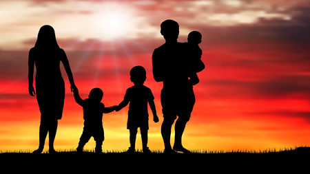 Family silhouette of a beautiful sunsetのイラスト素材