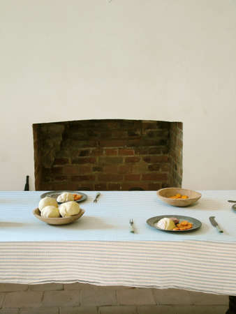View of a traditional, simple kitchen table setting