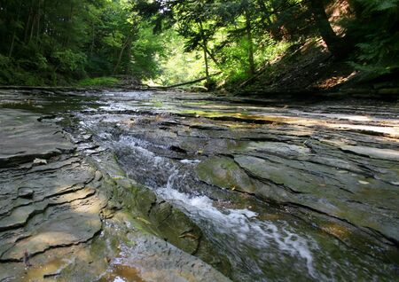 Wild river at the bottom of Chautaqua Gorge in Upstate New Yorkの写真素材