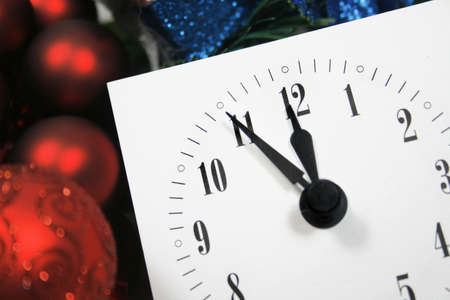 View of a clock, counting down to midnight on a New Year's night