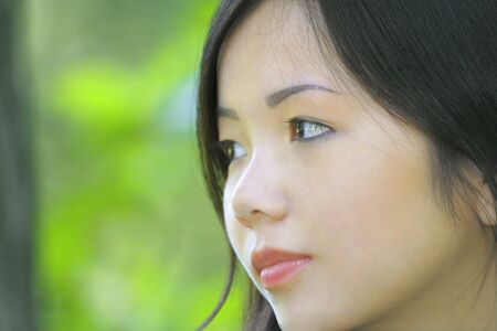 Portrait of a beautiful, young Asian femaleの写真素材