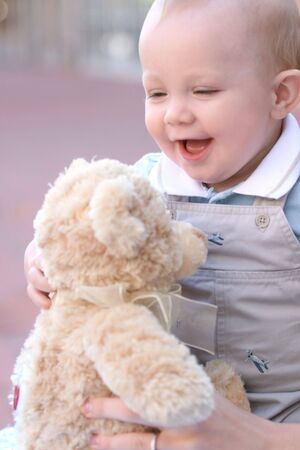 Cute, adorable baby boy with blue eyes and blond hairの写真素材