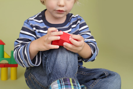 Child, kid, playing with building blocksの写真素材