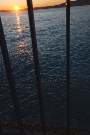 Sunset through the barsの写真素材