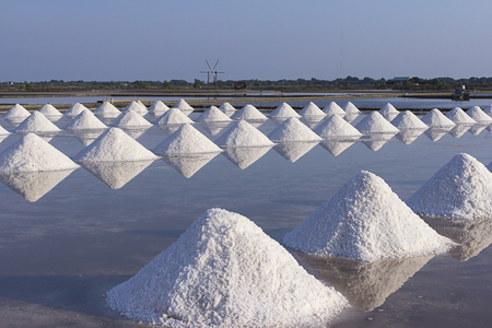 Heap of sea salt in salt farm in Thailand.の写真素材